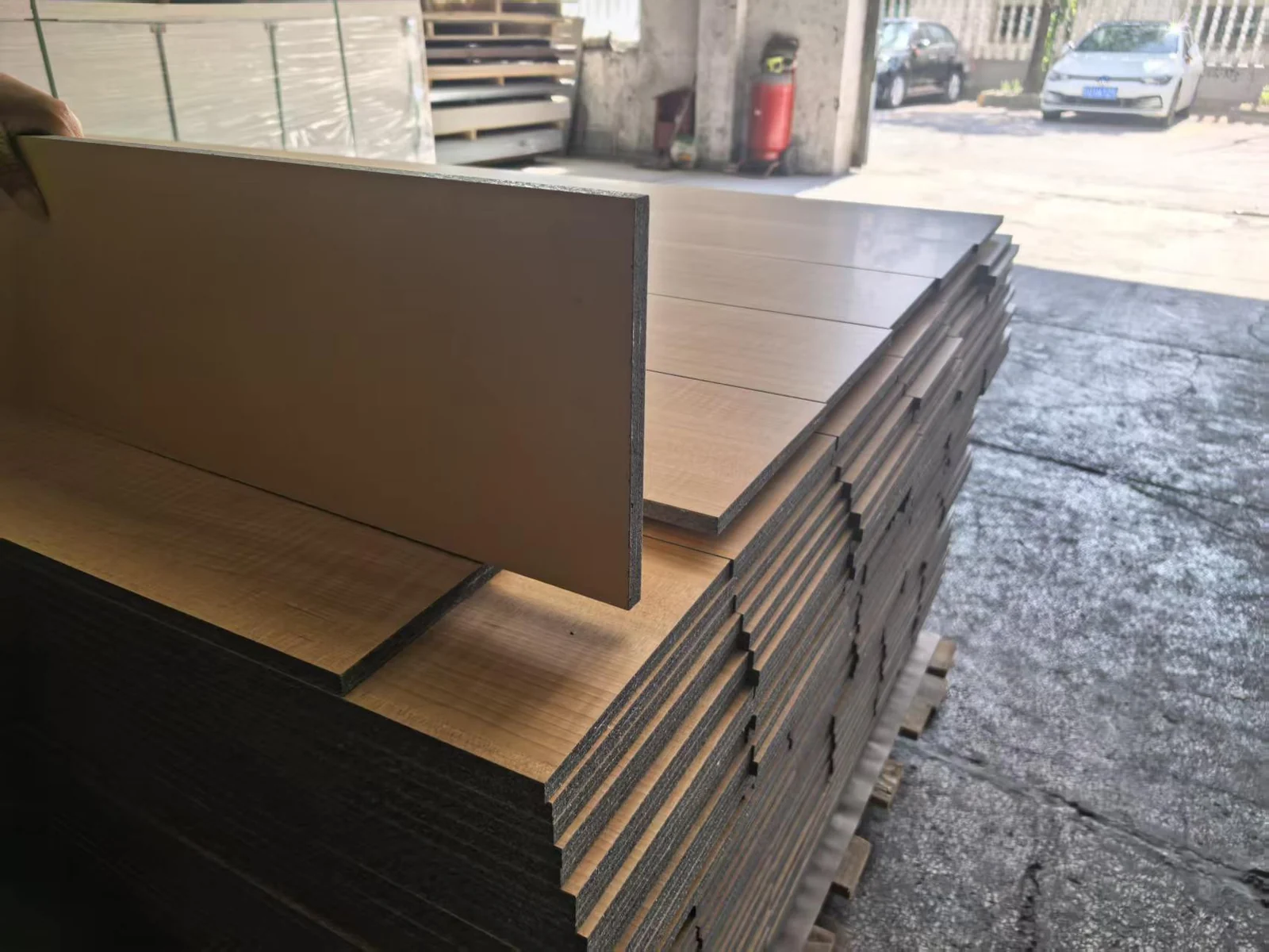 Wood finish acoustic panel stock in the workshop