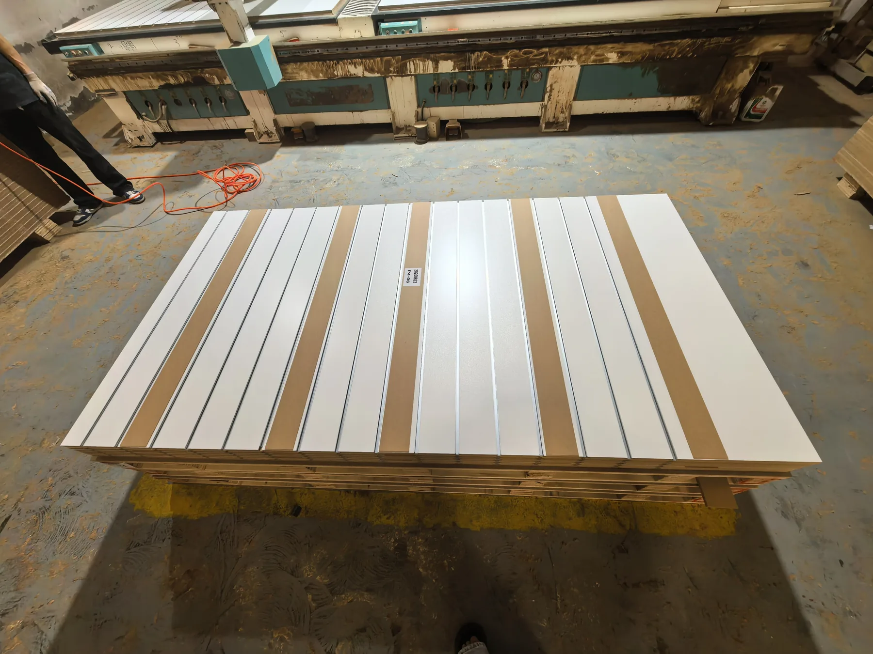 Batch of slatwall panels with inserts during factory production