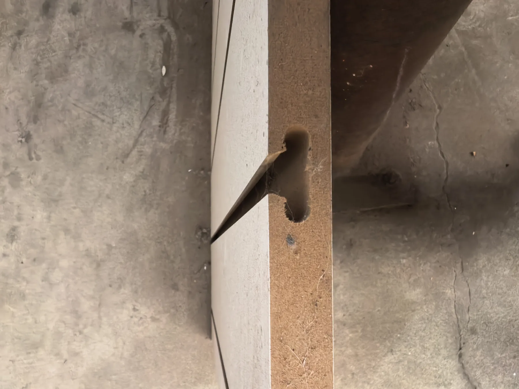 Project photo showing a machined rounded groove profile through an MDF panel